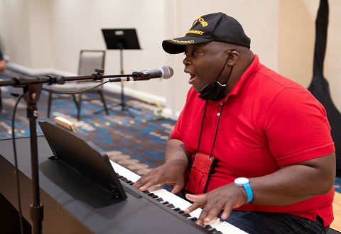 Jackie Williams is an Army Veteran, pastor, and six-time champion musician at the National Veteran Creative Arts Festival. After surviving a coma and fighting COVID-19, he is returning to the stage for the first time at this year’s event. Jackie Williams is an Army Veteran, pastor, and six-time champion musician at the National Veteran Creative Arts Festival. After surviving a coma and fighting COVID-19, he is returning to the stage for the first time at this year’s event.