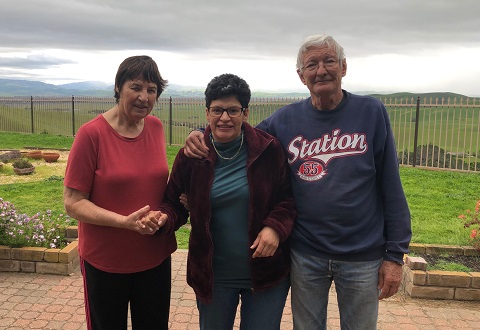 (Left to Right) Lisette, Mariela, and Emile Meylan pose for a family photo